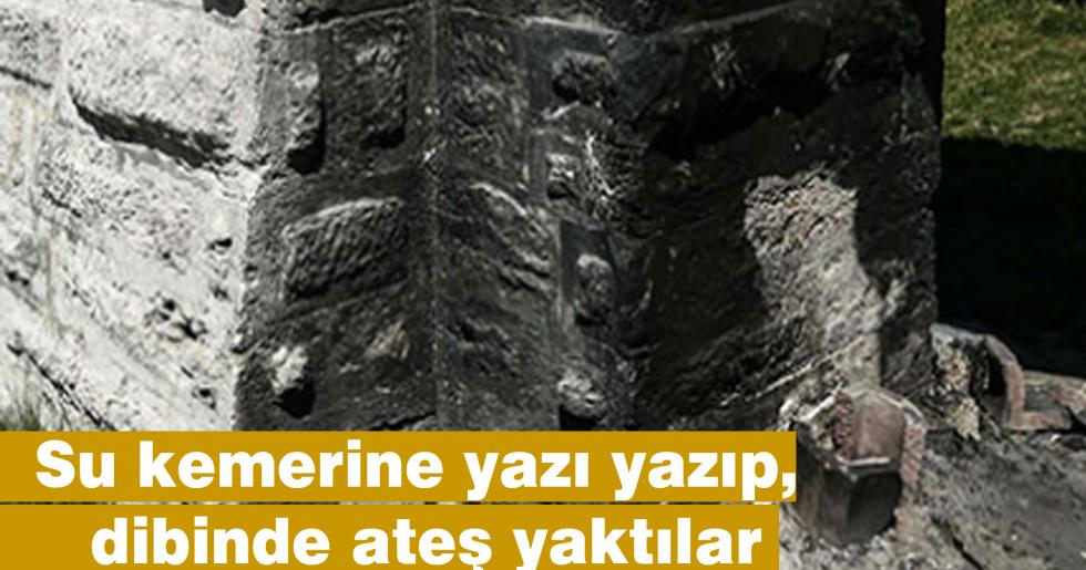 Restore edilen 400 yıllık su kemerine yazı yazıp, dibinde ateş yaktılar