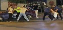 İzmir’de ceza yazan polise saldırdılar; o anlar kamerada